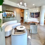 Another perspective of the clean, modern waiting room with multiple seating arrangements